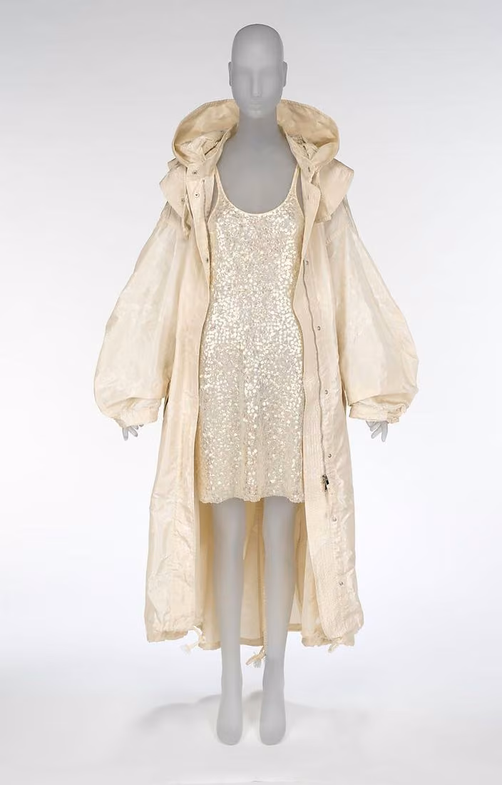 "BioSequin" dress and "Protein Evolution" parka, Stella McCartney, 2023