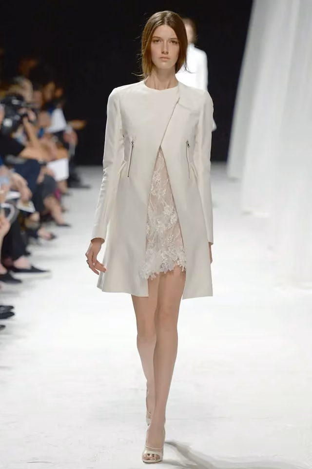 Collarless coat over a lace-appliqué dress, Nina Ricci, 2014
