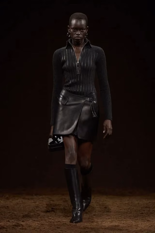 Black jacket and short skirt, Hermès, Fall 2025 Ready-to-Wear