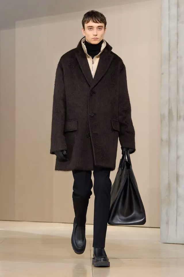 Dark tailored coat ensemble, Hermès, Fall 2025 Menswear