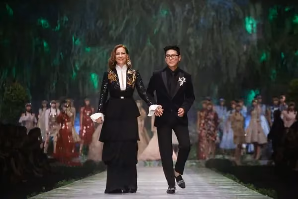 Group photograph of Sebastian Gunawan and Cristina Panarese