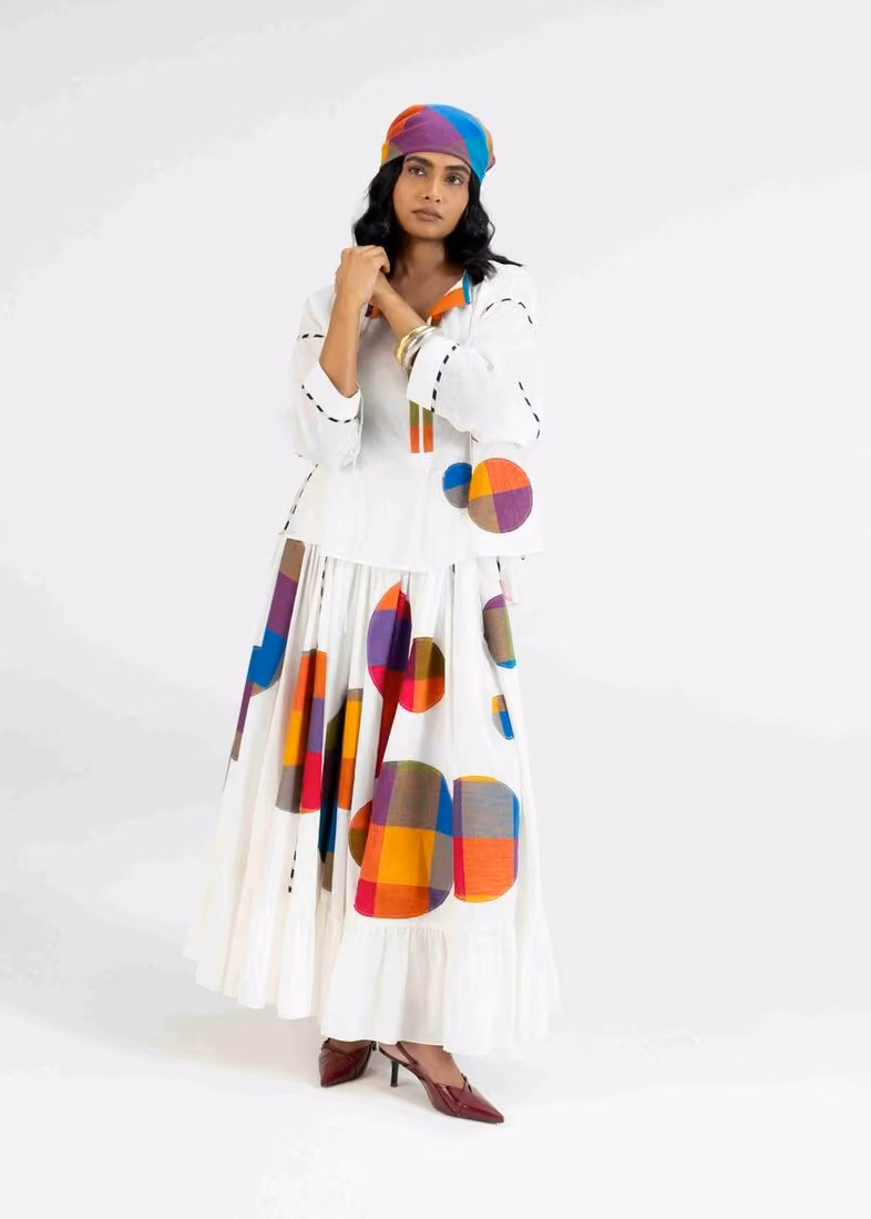 Off-white Gypsy skirt and top with colourful graphic circles — Abu Jani & Sandeep Khosla