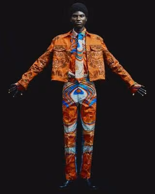 Orange cropped jacket and psychedelic patterned shirt, trousers and tie — Adebayo Oke-Lawal
