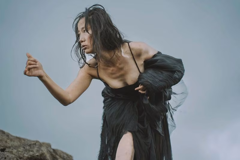 Black sculptural dress photographed outdoors — Ásta Vilhelmína Guðmundsdóttir