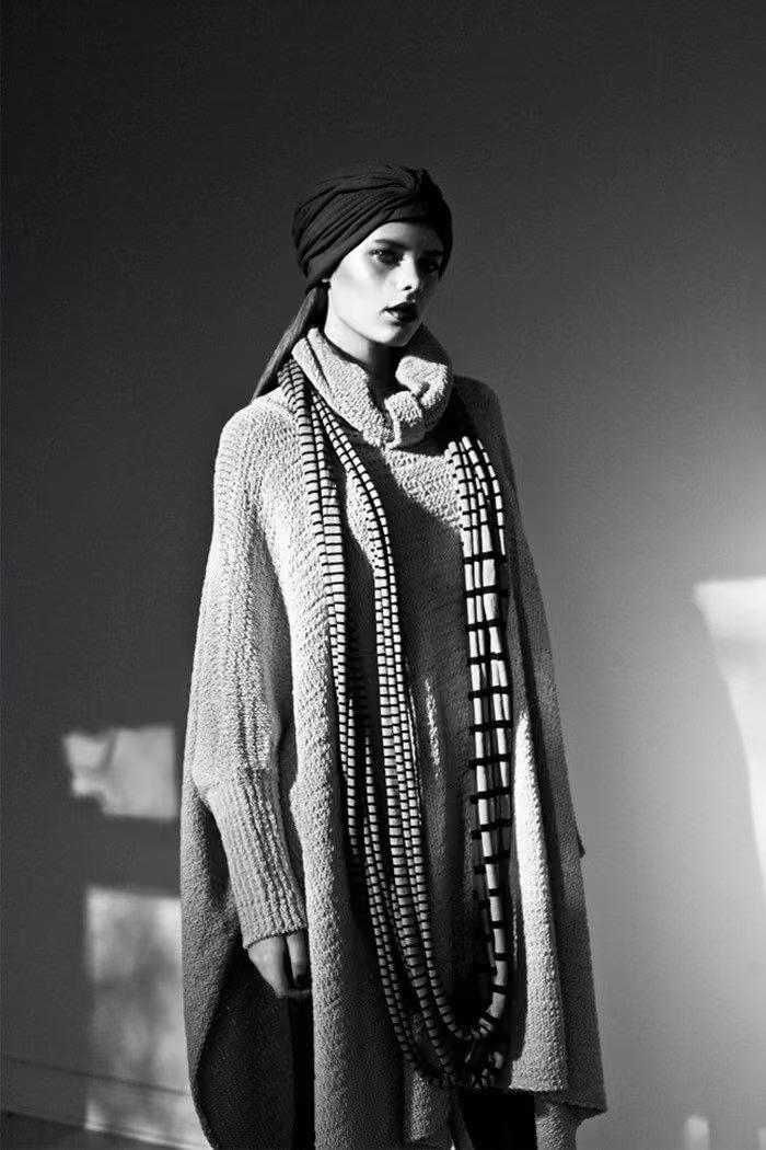 Textured knitted coat and layered knit ensemble — Bitte Kai Rand