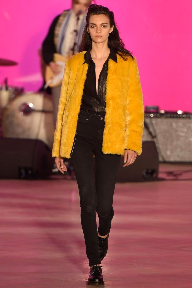 Yellow jacket over a black ensemble — Look 1 — Mads Nørgaard