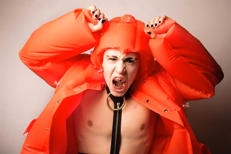 Red inflatable jacket — Michiko Koshino