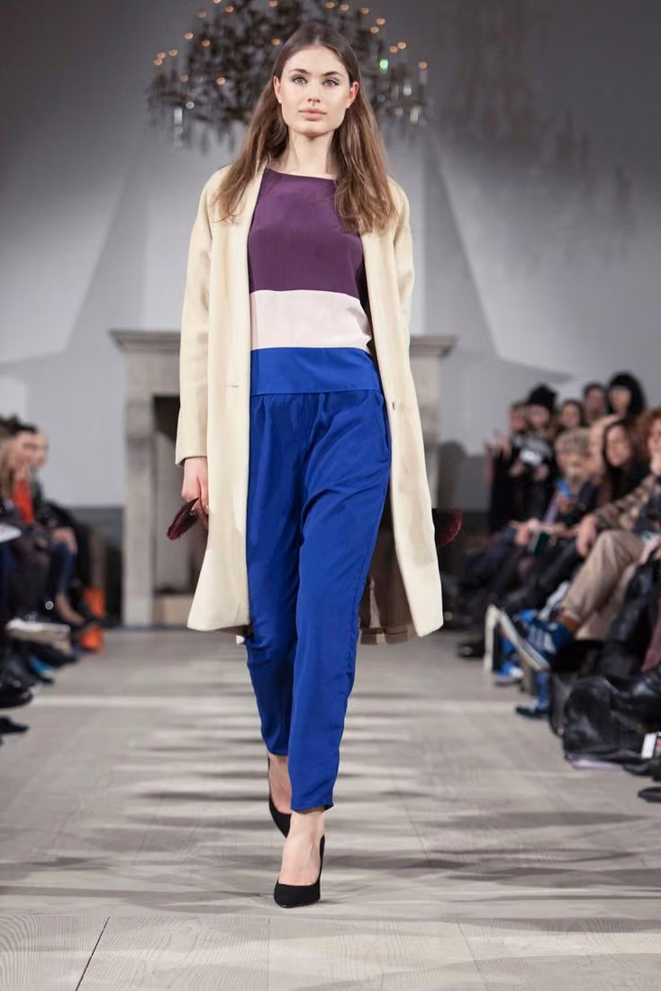 Color-block top, blue trousers and light coat — Look 1 — Veronica B. Vallenes