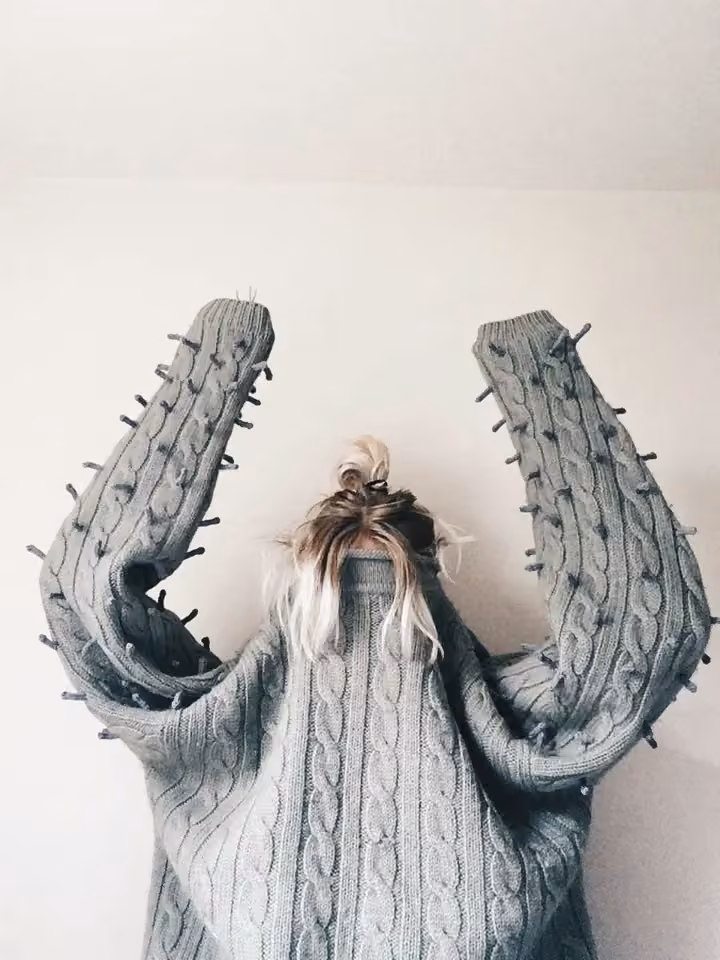 Grey cable-knit sweater with thorn-like additions — Ýr Jóhannsdóttir, Date not documented; project began 2015