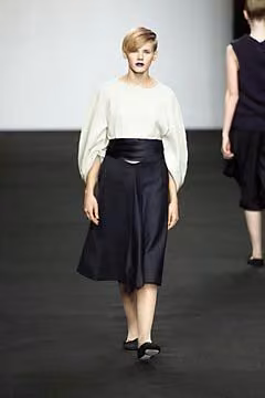 Pale balloon-sleeve top and dark skirt by Shelley Fox, Fall 2001 Ready-to-Wear.