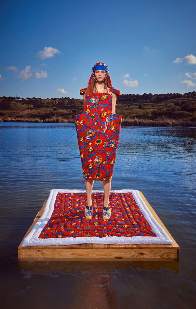 Red sculptural floral dress by Hakaan Yildirim, Istanbul Fall 2021.