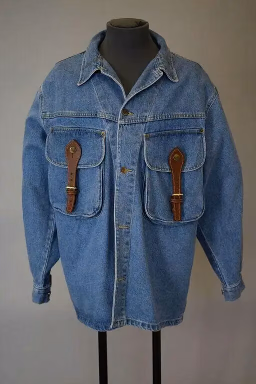 Denim jacket with leather pocket fastenings — Karl Kani, 1994