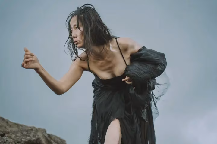Black sculptural dress photographed outdoors — Ásta Vilhelmína Guðmundsdóttir, Date not documented