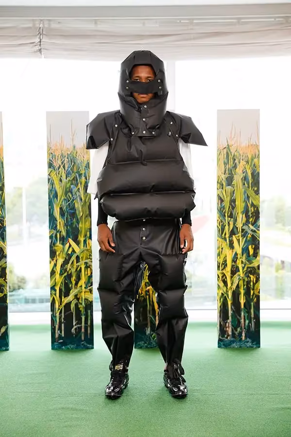 Black inflated hooded vest and trousers — Michiko Koshino, Spring/Summer 2018