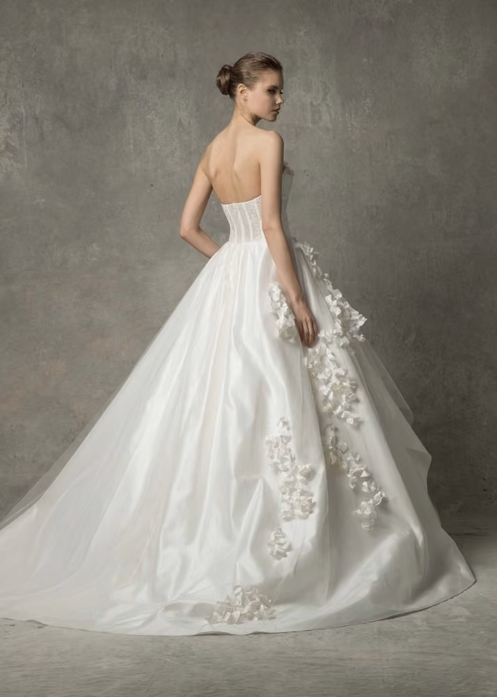 Strapless gown with full train by Angel Sanchez, Bridal Spring 2017.