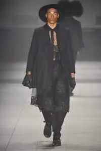 Black tailored coat with lace layers — João Pimenta, 2022