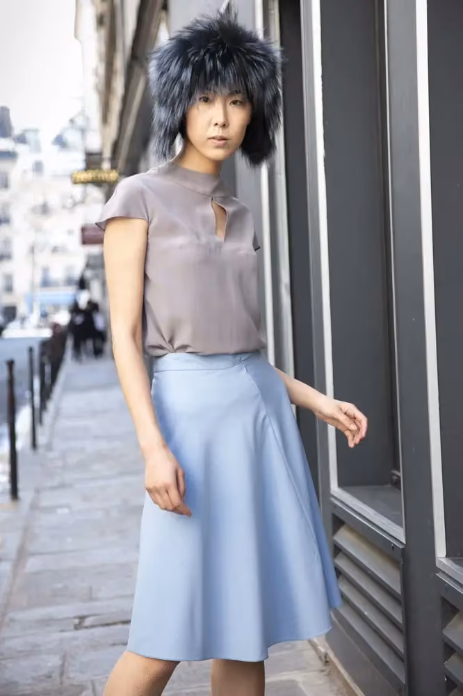 Sleeveless top and blue wide trousers — Anna Ruohonen, Date not documented