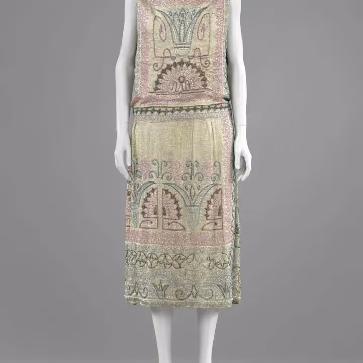 Silver-lamé evening dress with coloured beads and artificial pearls — Erté, c. 1922–1924