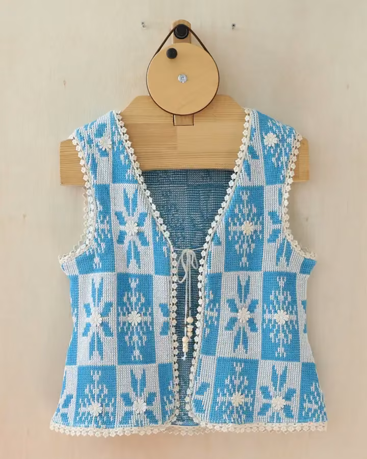 Blue patterned knitted vest — Youngshin Hong & Sang Lim Lee, Date not documented