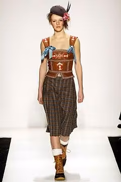 Patterned knit vest and checked skirt — James Coviello, Fall 2003 Ready-to-Wear