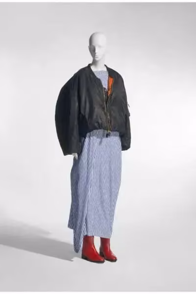 Black bomber jacket over a striped dress — Marina Yee, Spring/Summer 2024