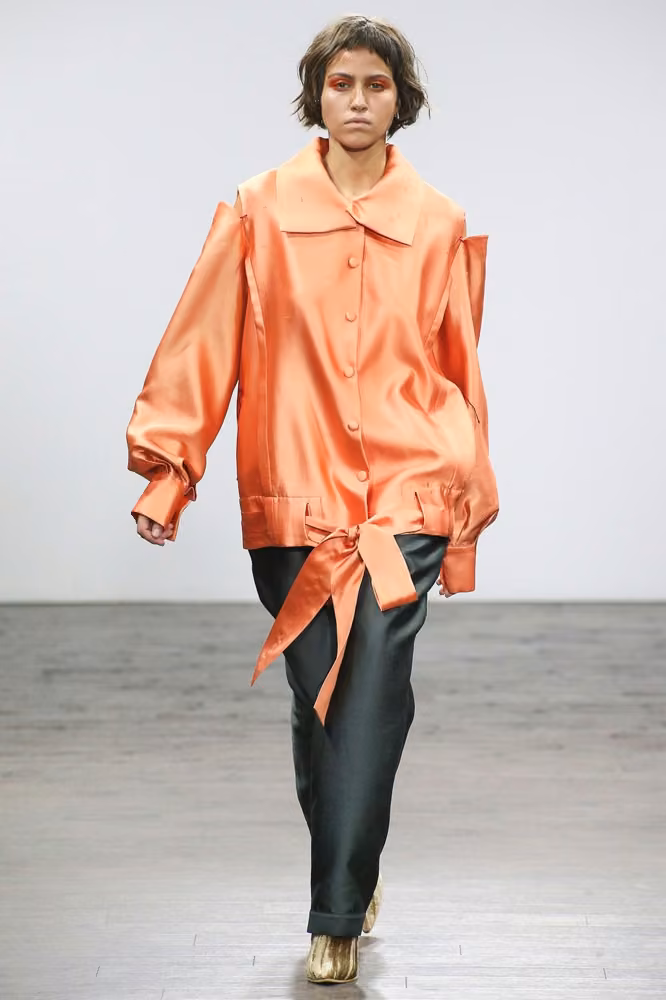 Orange loose shirt and dark trousers — Nino Babukhadia, Tbilisi Spring 2017