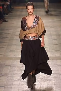 Draped tan layer over a patterned top — Marjan Pejoski, Fall 2002 Ready-to-Wear