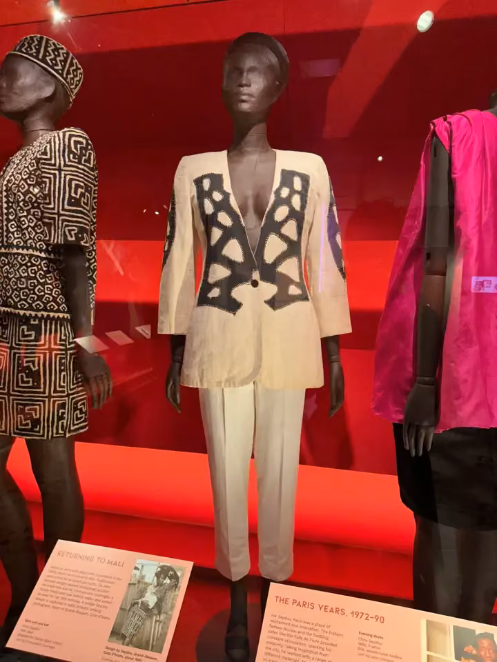 Cream trouser suit with dark appliqué — Chris Seydou, 1992