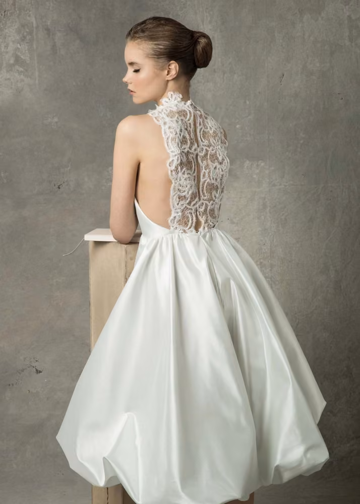 High-neck bubble-hem gown by Angel Sanchez, Bridal Spring 2017.
