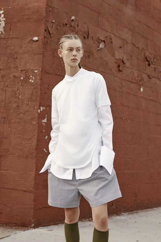 White layered shirt and gray shorts by Josh Goot, Spring 2017 Ready-to-Wear.
