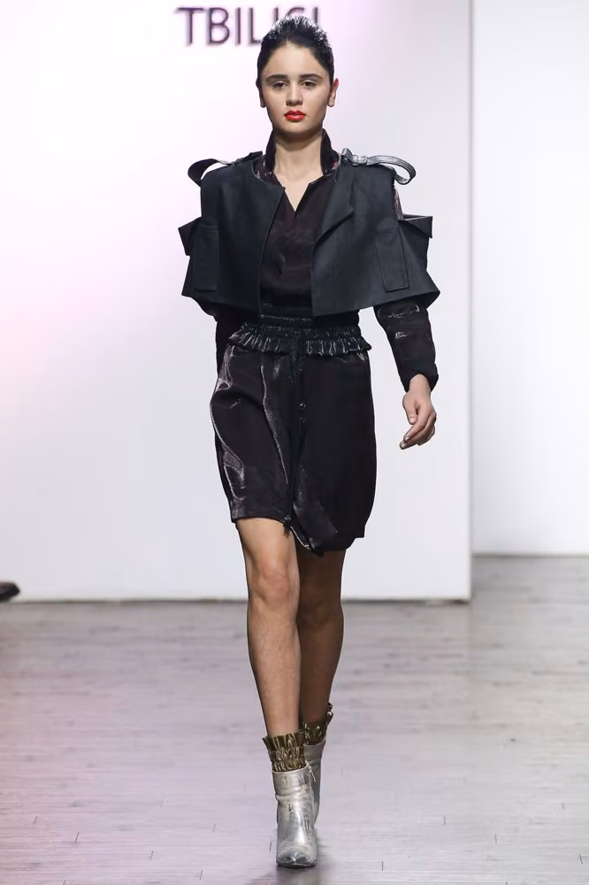Black exaggerated-shoulder jacket and shorts — George Pantsulaia, Tbilisi Spring 2017