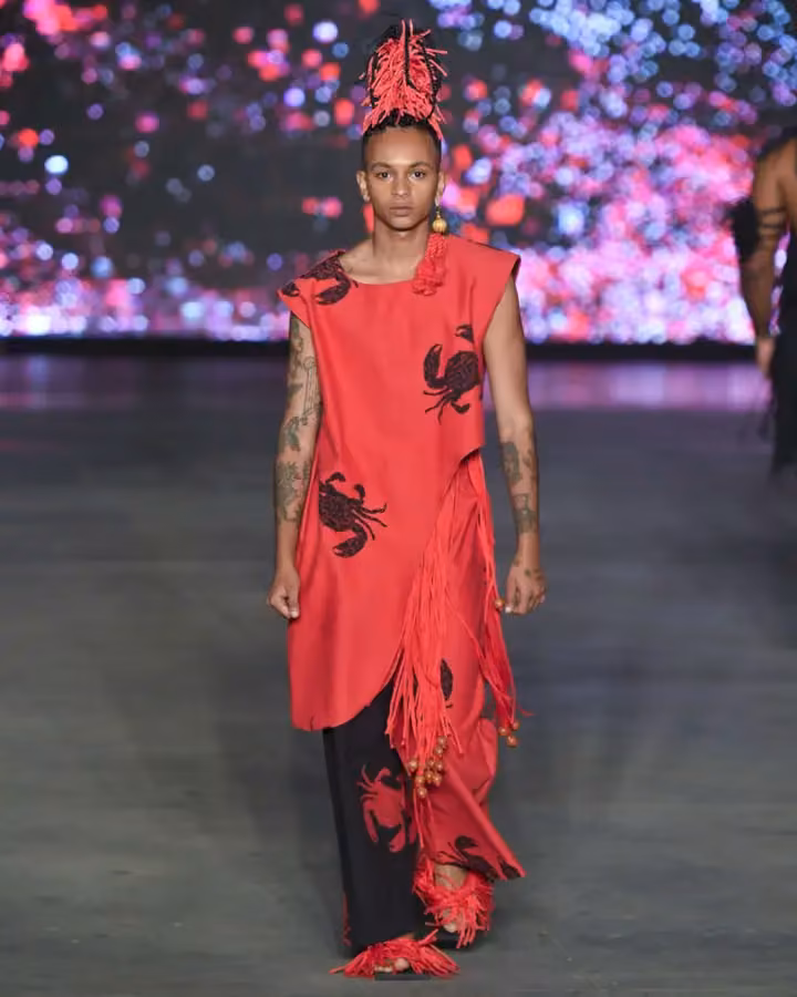Red crab-motif tunic and trousers — Dayana Molina, Shown July 2024