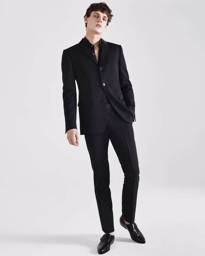 Dark tailored suit by Jeffrey Rüdes, Fall 2017 Menswear.