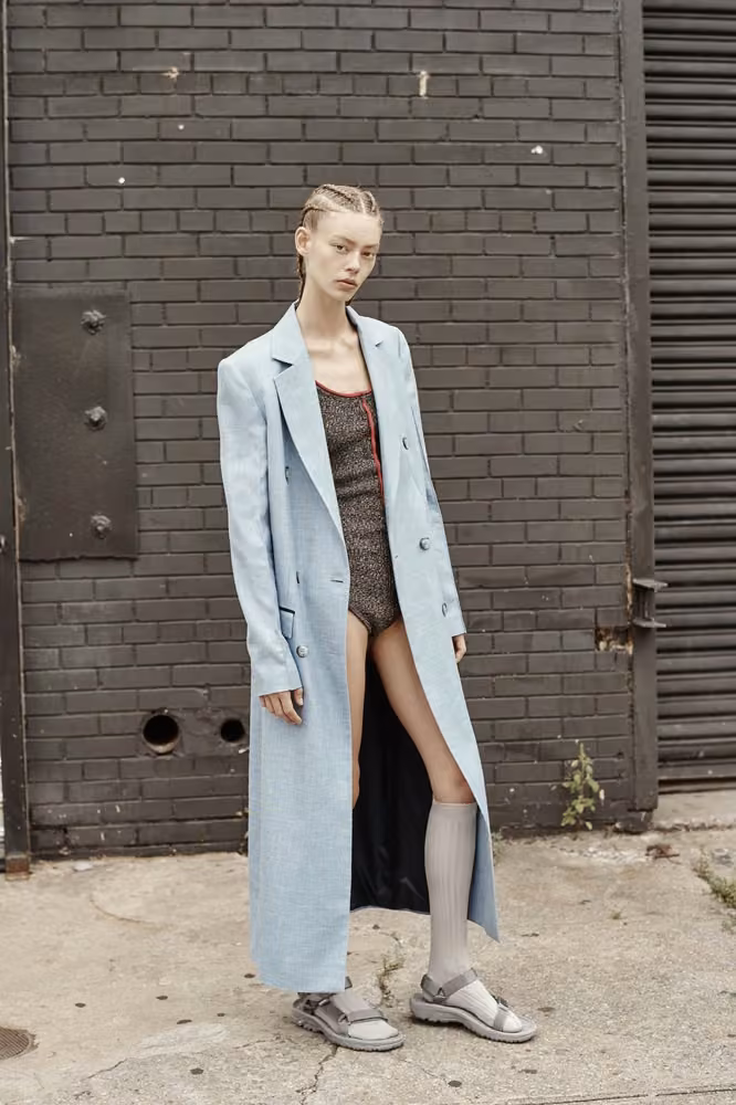 Pale blue coat over a bodysuit by Josh Goot, Spring 2017 Ready-to-Wear.