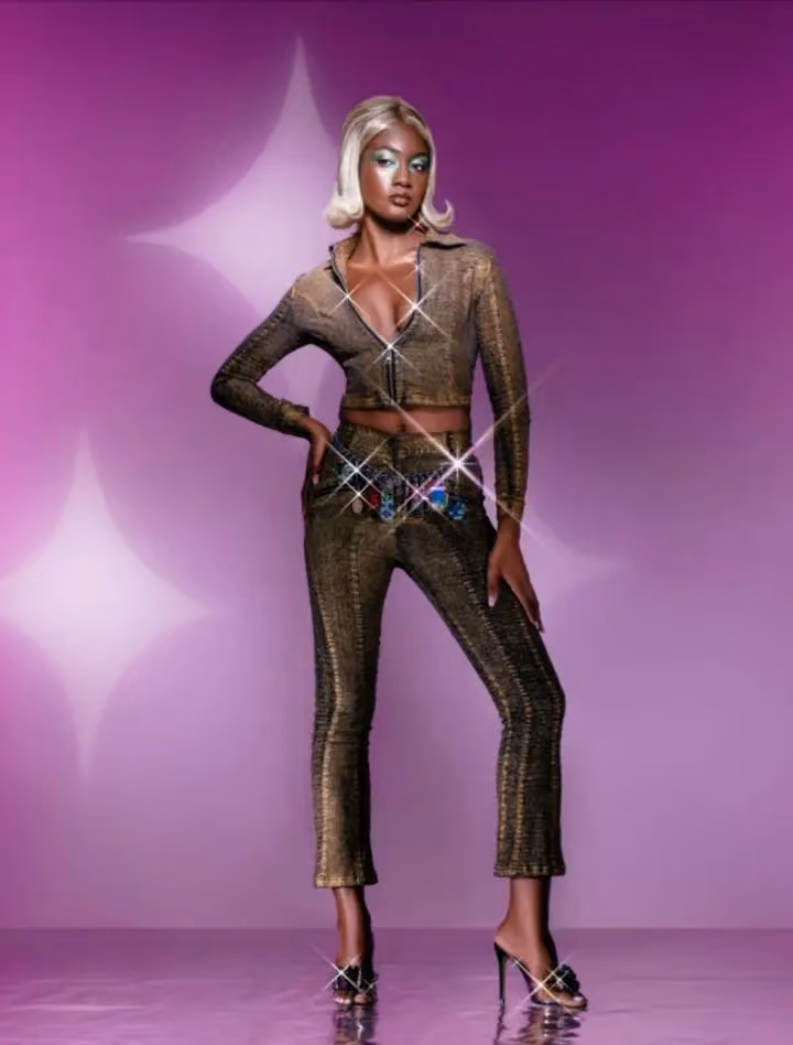 Metallic crop top and narrow trousers — Sinead Gorey, Date not stated