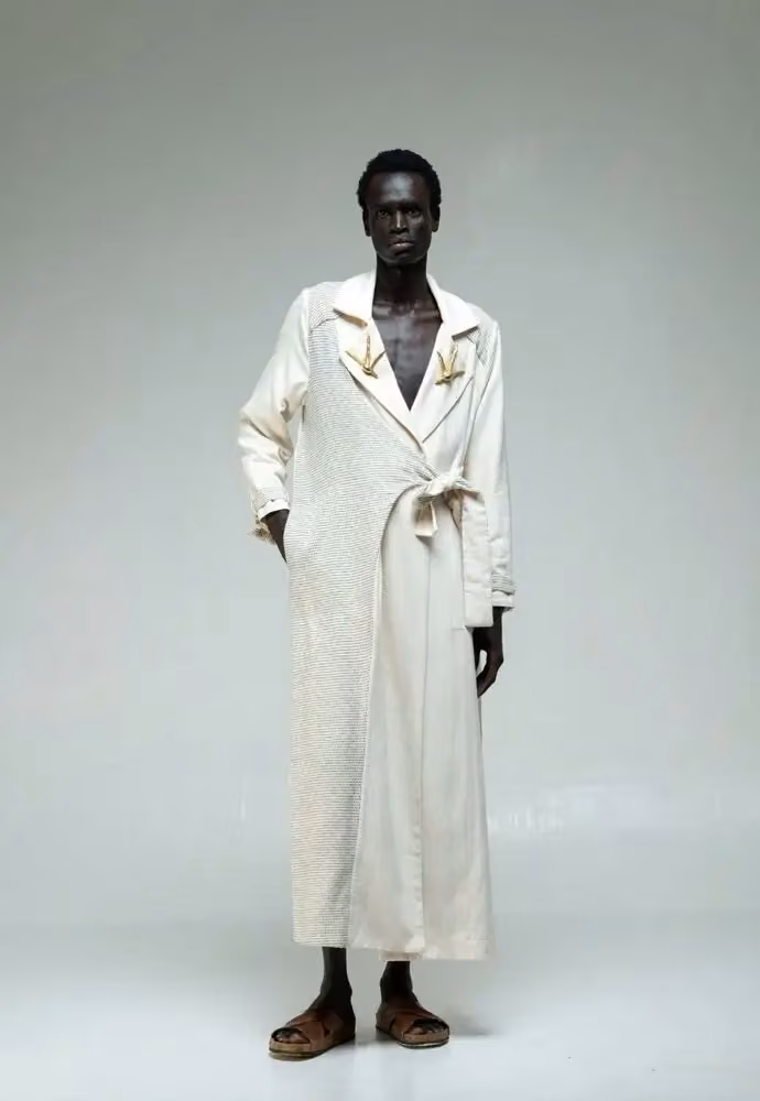 Anga handwoven trench coat — Katungulu Mwendwa, Date not documented