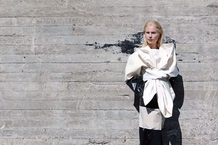 Black-and-white ensemble with sculptural waist knot — Satu Maaranen, 2012; shown at Hyères 2013