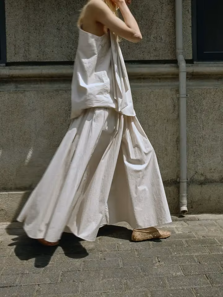 Fluid white sleeveless top and draped skirt — Viktoria Chan, Date not documented