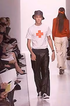 White cross-motif T-shirt and black trousers, Matt Nye, Spring 2000 Ready-to-Wear.