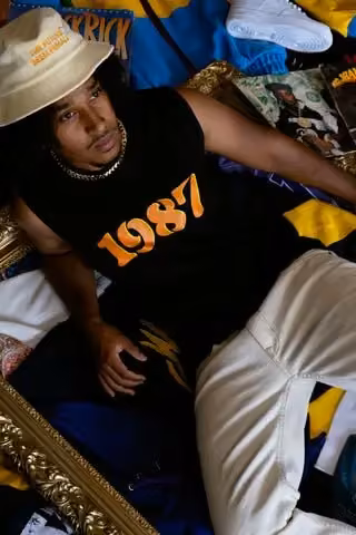 Black “1987” tank top — April Walker, Date not stated