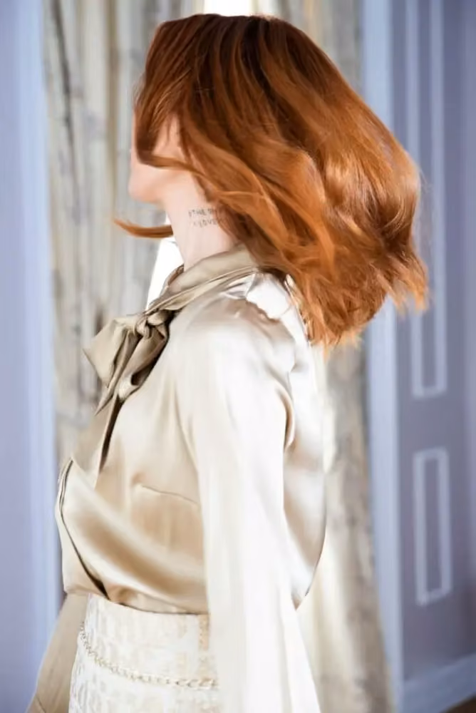 Ivory satin blouse from the Signature Collection — Kathrine Nørgård, Date not documented