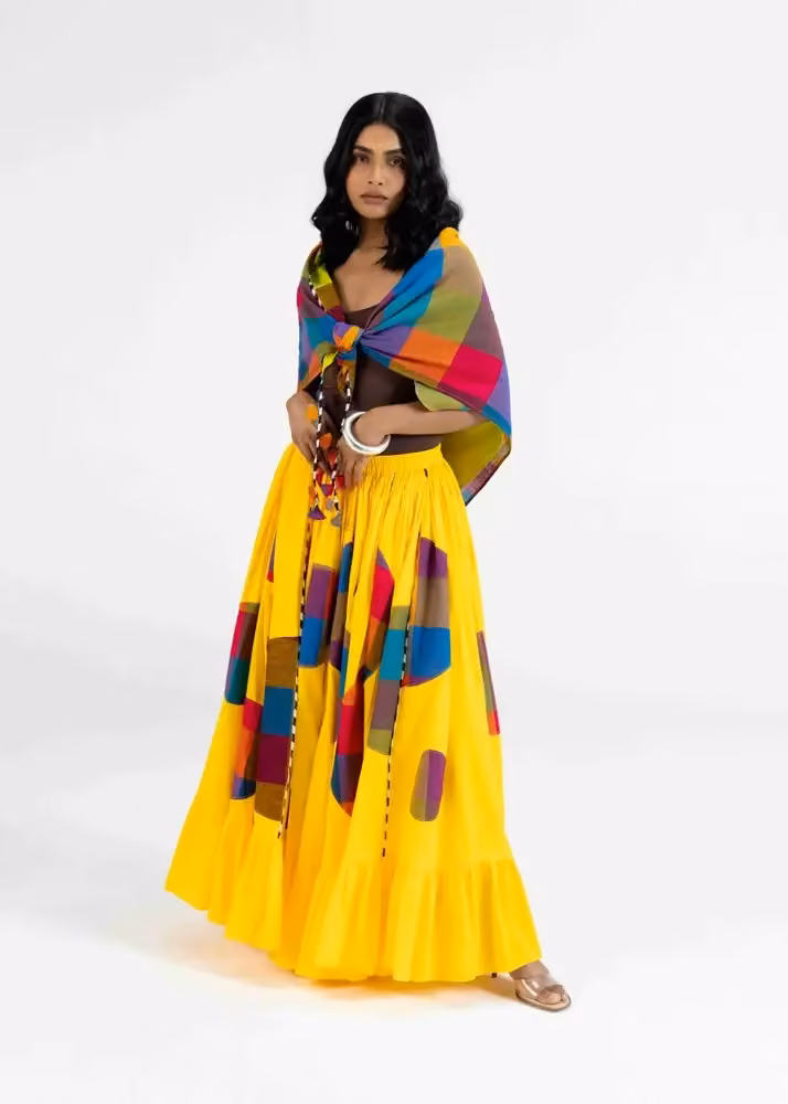 Yellow skirt with a multicolored wrap top — Abu Jani & Sandeep Khosla, Date not stated
