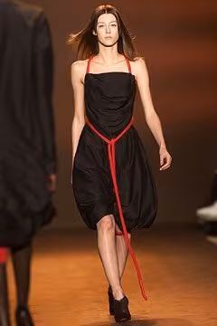 Black draped dress with red ties by Richard Edwards, Fall 2002 Ready-to-Wear.